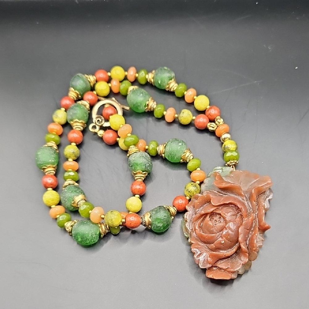 Elegant Beaded Necklace with Floral Pendant